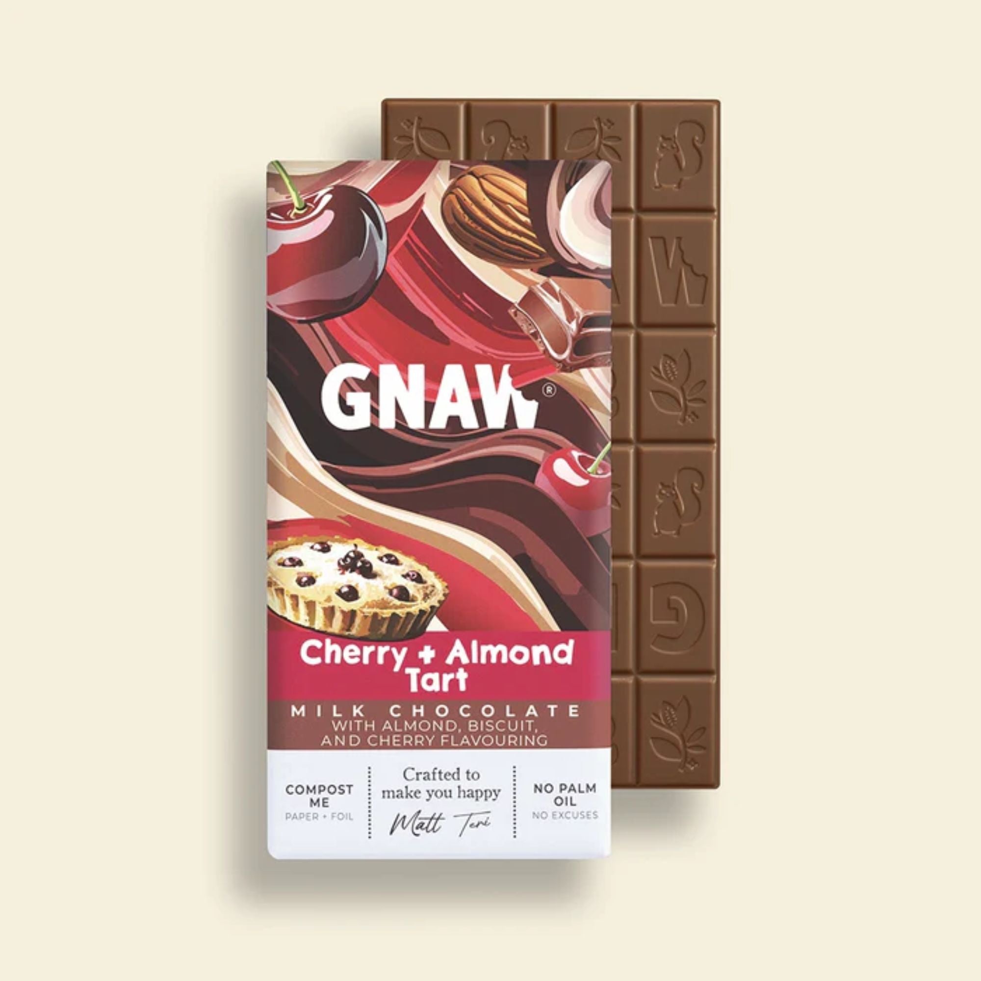 Chocolate bar with cherry and almond flavor packaging on a beige background