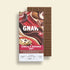 Chocolate bar with cherry and almond flavor packaging on a beige background