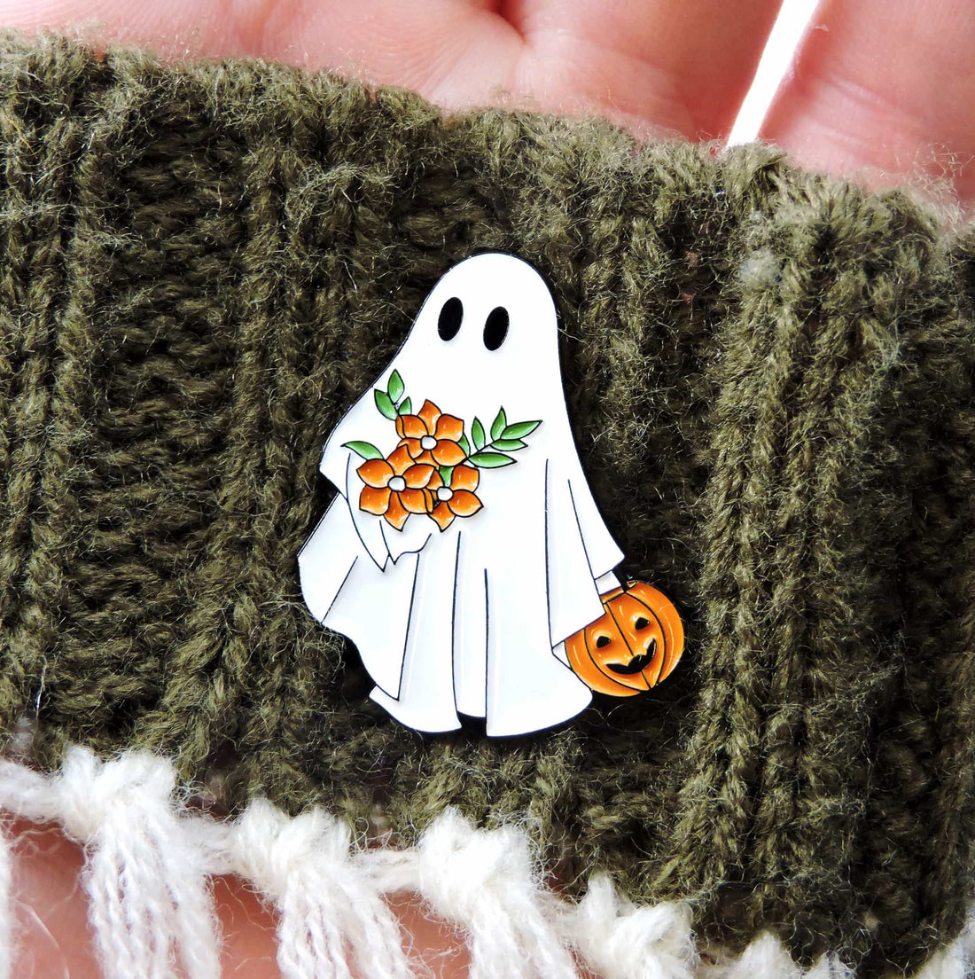 Ghost Pin with a playful pumpkin and floral accents, perfect for adding Halloween charm to outfits or accessories.