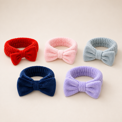 Gifts for her featuring plush bowknot headbands shown in a selection of available colours.