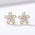 Gifts for her – gold flower stud earrings with cubic zirconia