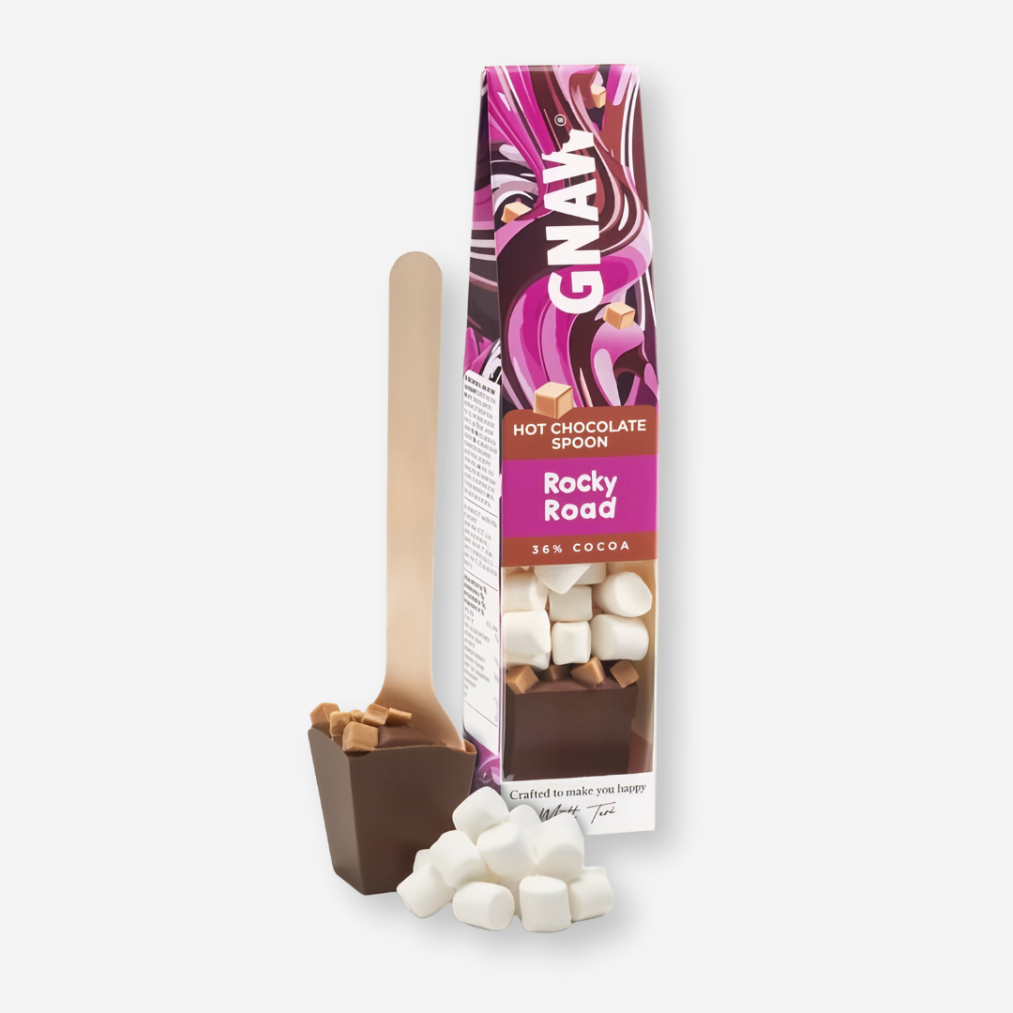 Gnaw Rocky Road Hot Chocolate Spoon with mini marshmallows on smooth milk chocolate, designed to melt in warm milk for a creamy hot chocolate experience.