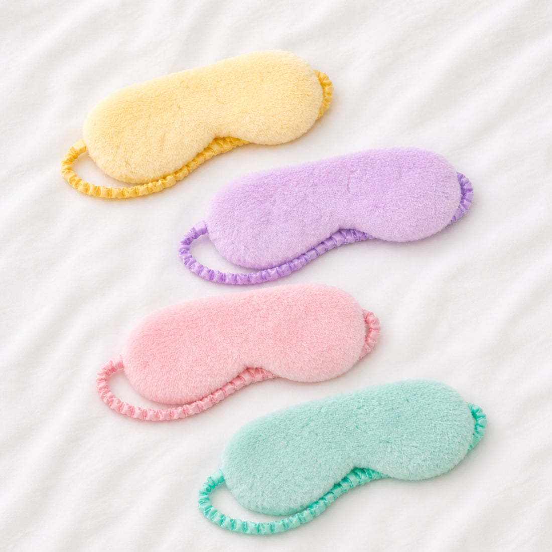 Plush Eye Masks, featuring an ultra-soft texture and secure fit, ideal for blocking light and enhancing sleep comfort.