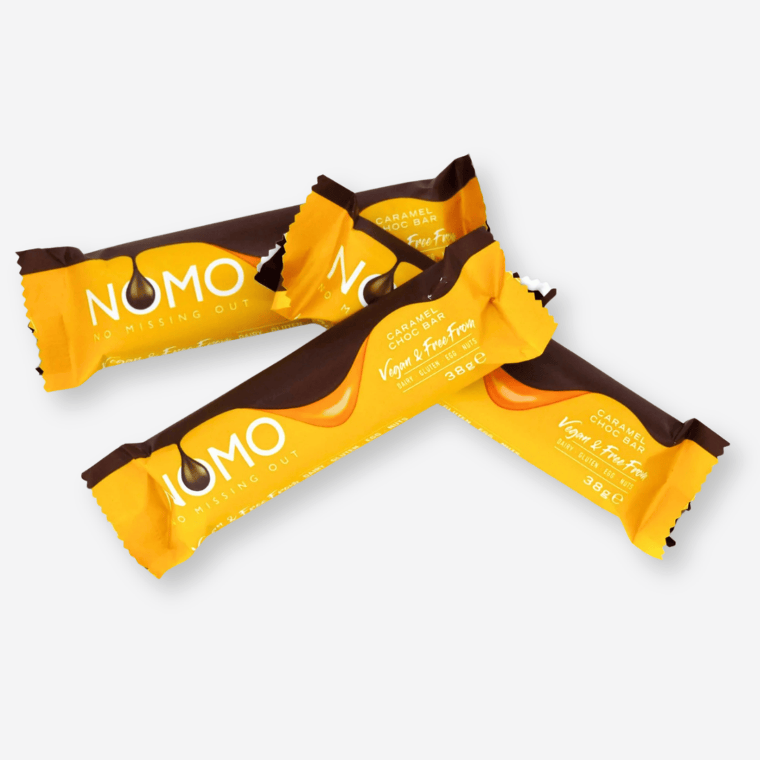 NOMO Caramel - 1pc: Close-up of a vegan chocolate bar with caramel filling, showcasing its smooth texture, perfect for allergen-free indulgence.