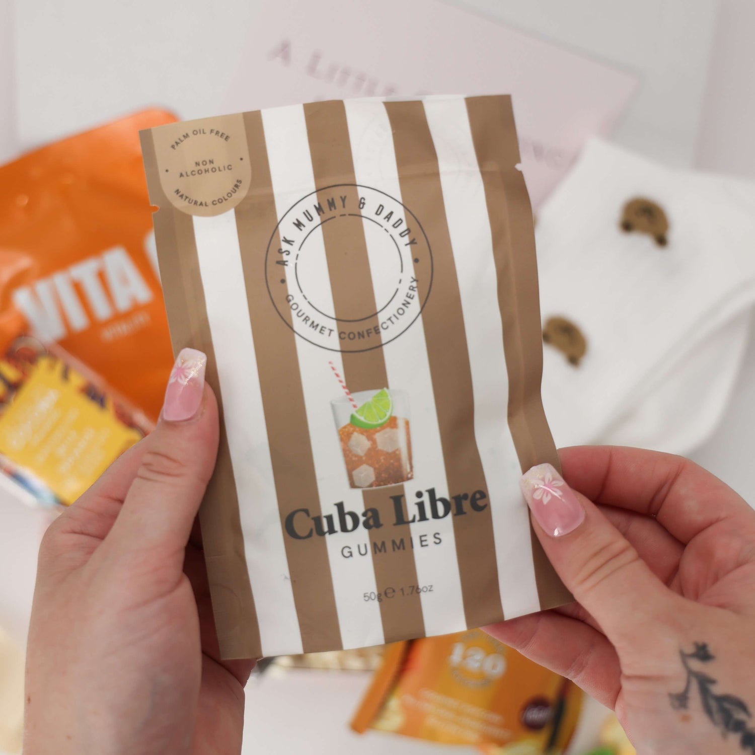 Comfort gift box with cute bear socks, Cuba Libre gummies, and self care items