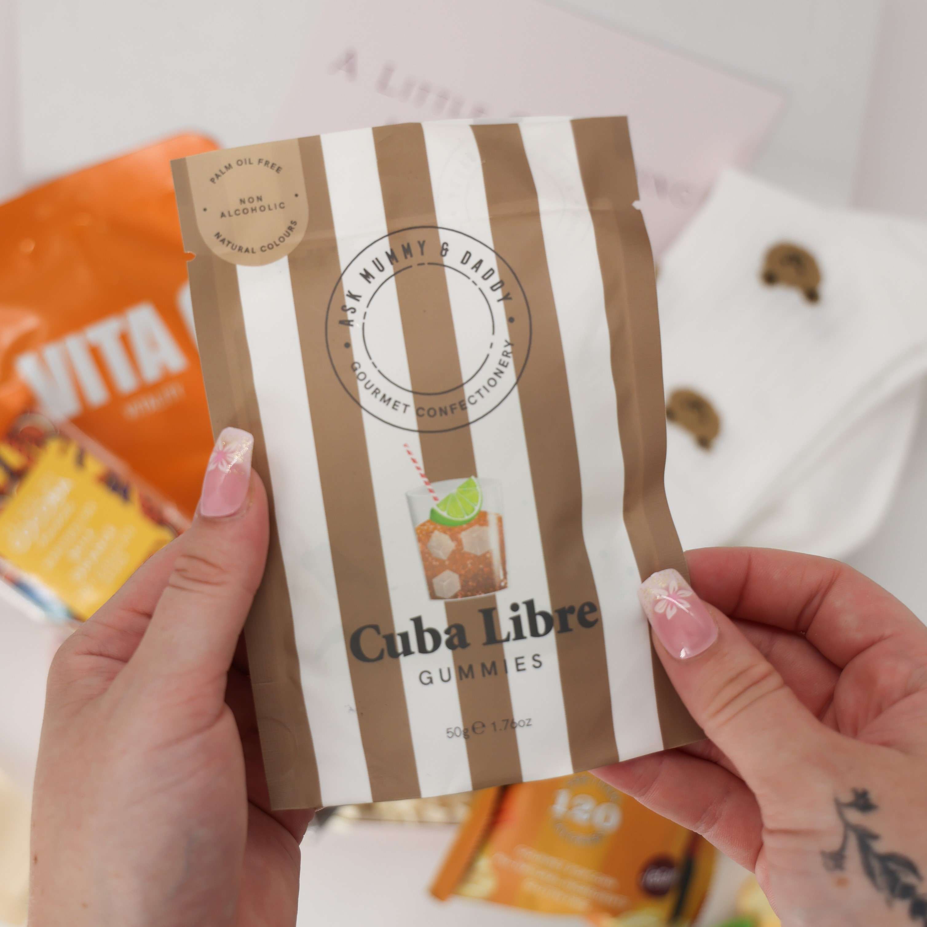 Comfort gift box with cute bear socks, Cuba Libre gummies, and self care items