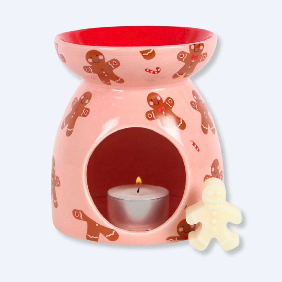 Gingerbread Wax Melt Burner featuring a smiling gingerbread man design with candy cane accents and a red bowl, includes an eco-friendly gingerbread man soy wax melt.