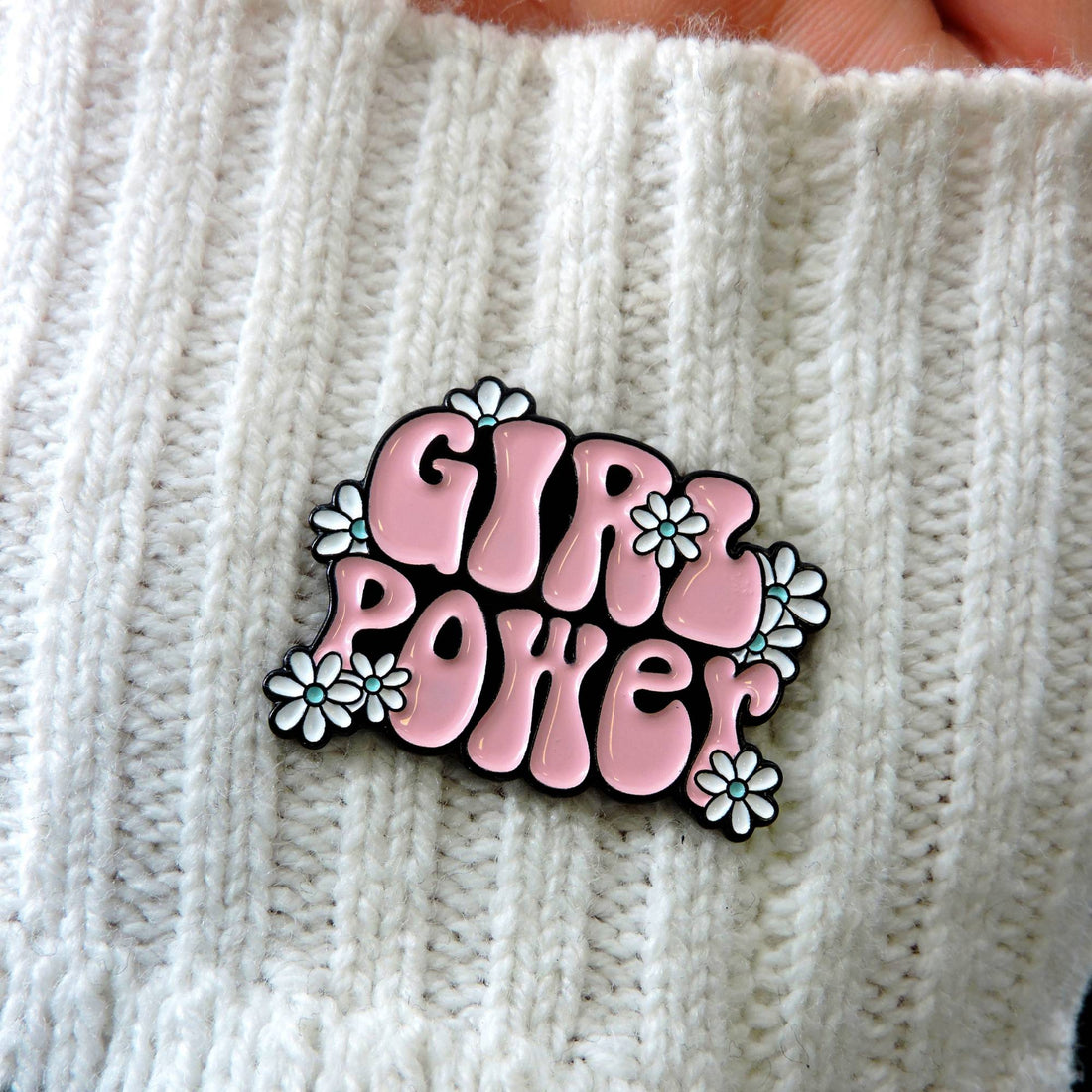 Girl Power Enamel Pin featuring retro design with floral and letter details, perfect for adding a touch of empowerment to jackets, bags, or hats.