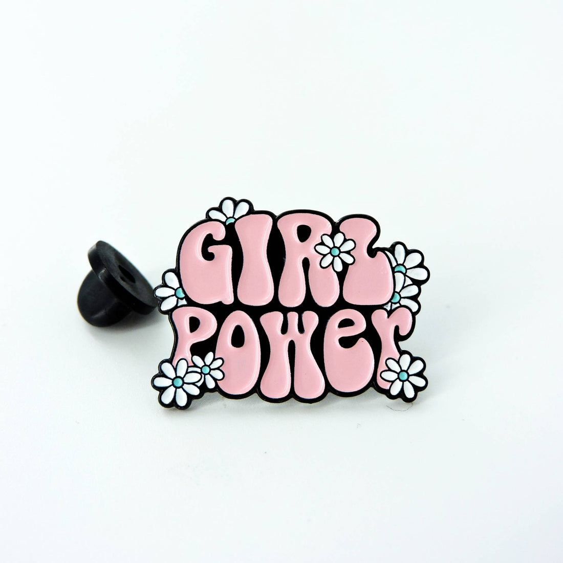 Girl Power Enamel Pin featuring a retro design, embodying empowerment with floral graphics, perfect for enhancing jackets, bags, or hats with positivity.