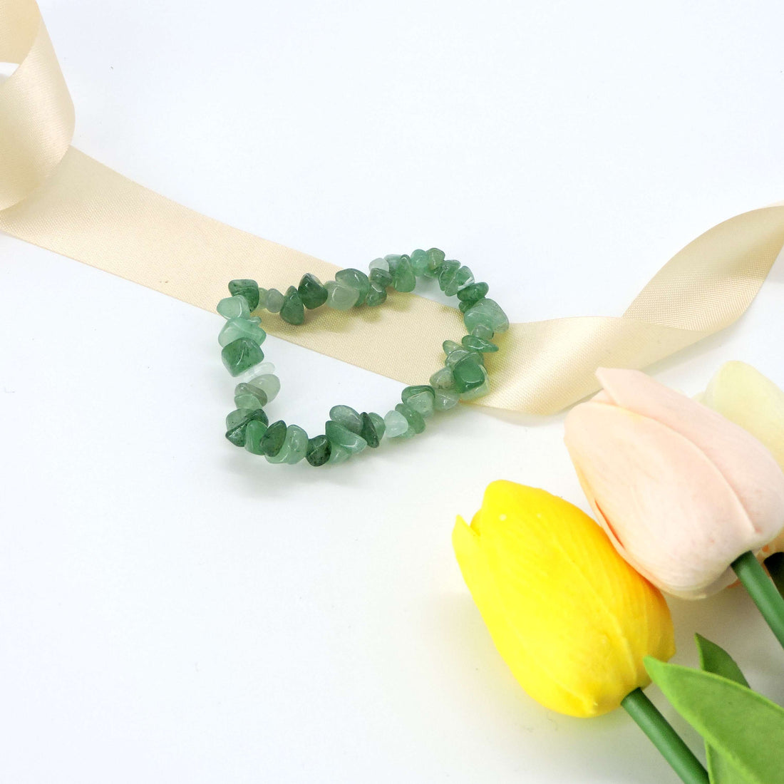 Aventurine Crystal Chip Bracelet made from natural green aventurine chips, offering a calming and elegant touch for everyday wear and holistic wellness.