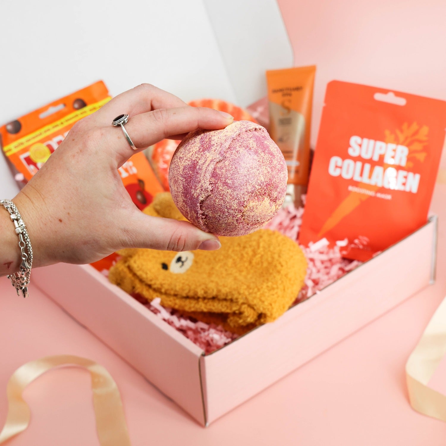 hug in a box – bright orange pamper box filled with cosy, sweet and relaxing surprises
