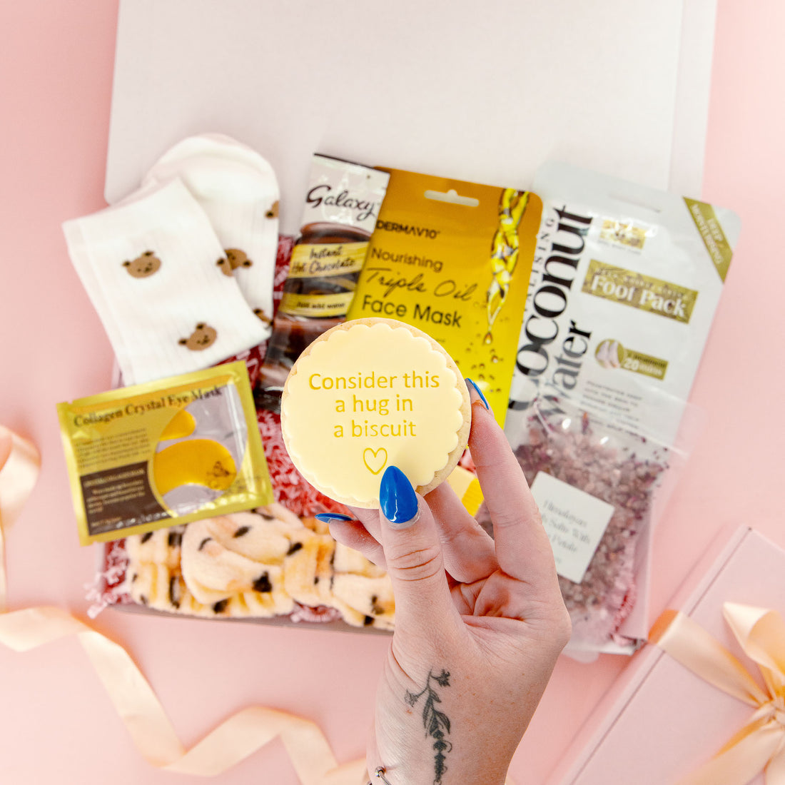 Self care gift box for her with &quot;hug in a biscuit&quot;, pamper treats, face mask, chocolate and cozy bear socks – thoughtful gift for women.