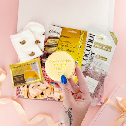 Self care gift box for her with &quot;hug in a biscuit&quot;, pamper treats, face mask, chocolate and cozy bear socks – thoughtful gift for women.