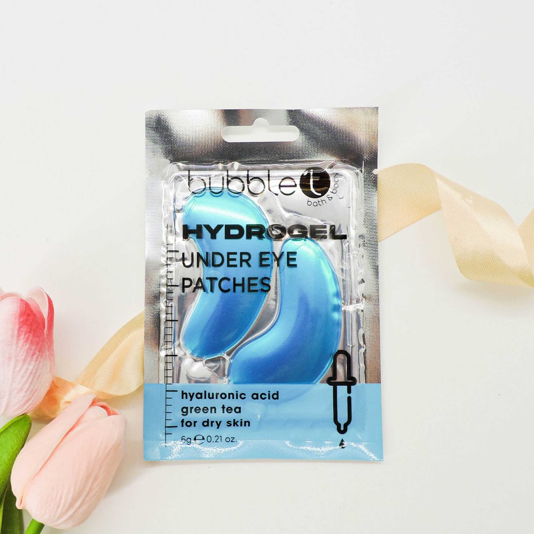 Hydrogel Hyaluronic Under Eye Patches in close-up, showcasing their sleek texture, designed to hydrate and refresh skin with hyaluronic acid and green tea infusion.