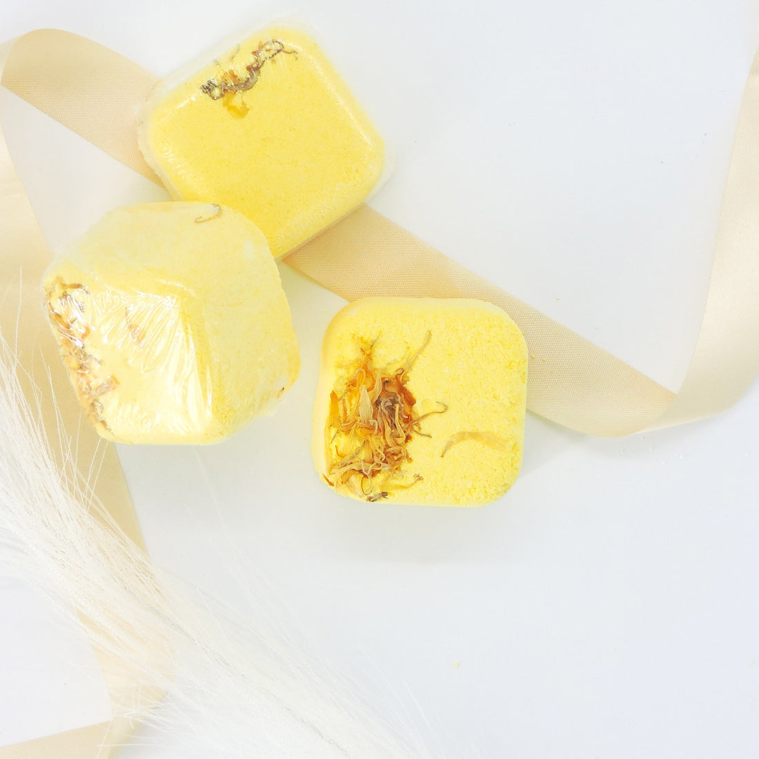 Aromatherapy Shower Steamer featuring spearmint, lemon, eucalyptus, and calendula, designed to invigorate your senses during showers, enhancing focus and energy.