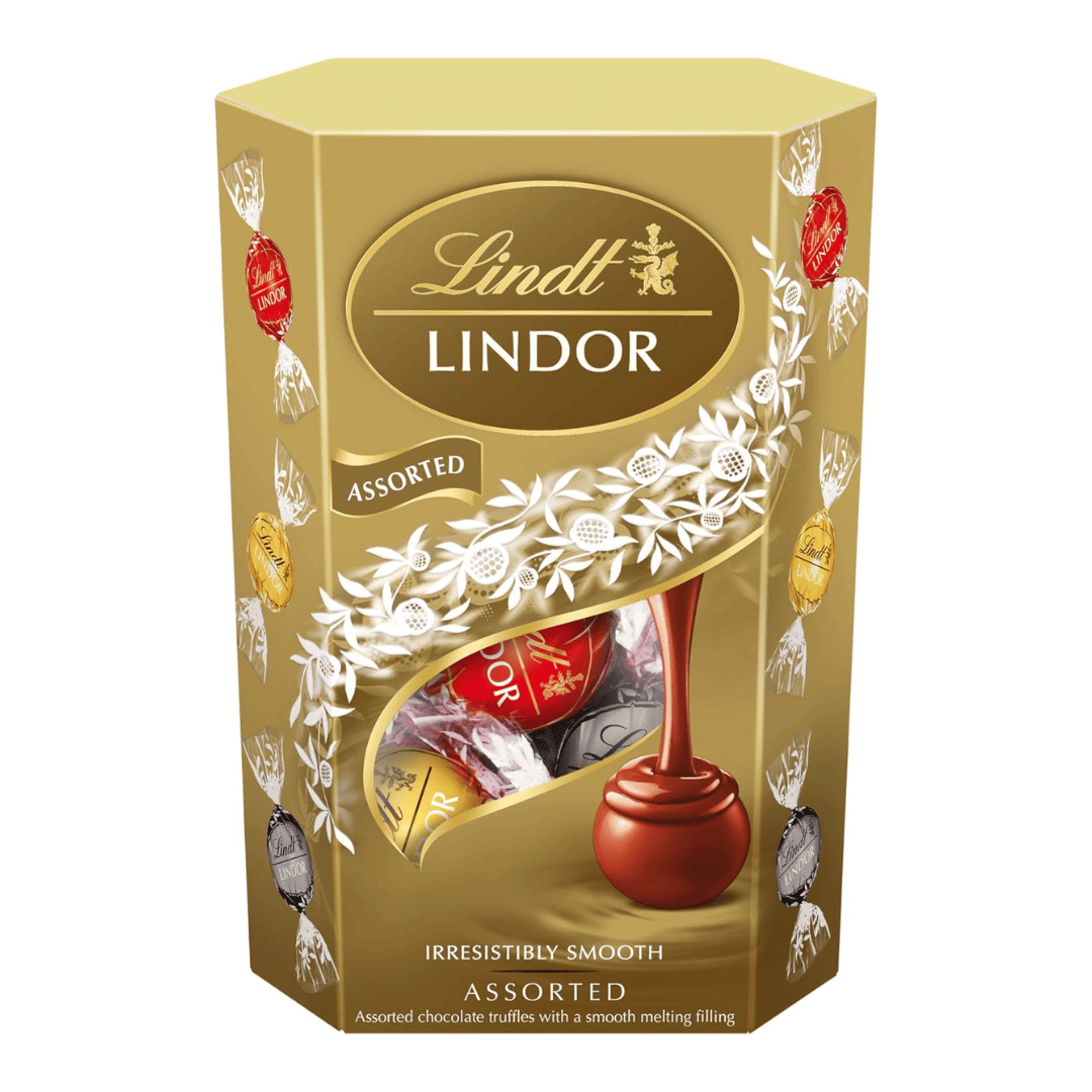 Lindt Milk Chocolate Treat close-up, showcasing its smooth, creamy texture and luxurious Swiss chocolate finish, ideal for indulging or gifting.
