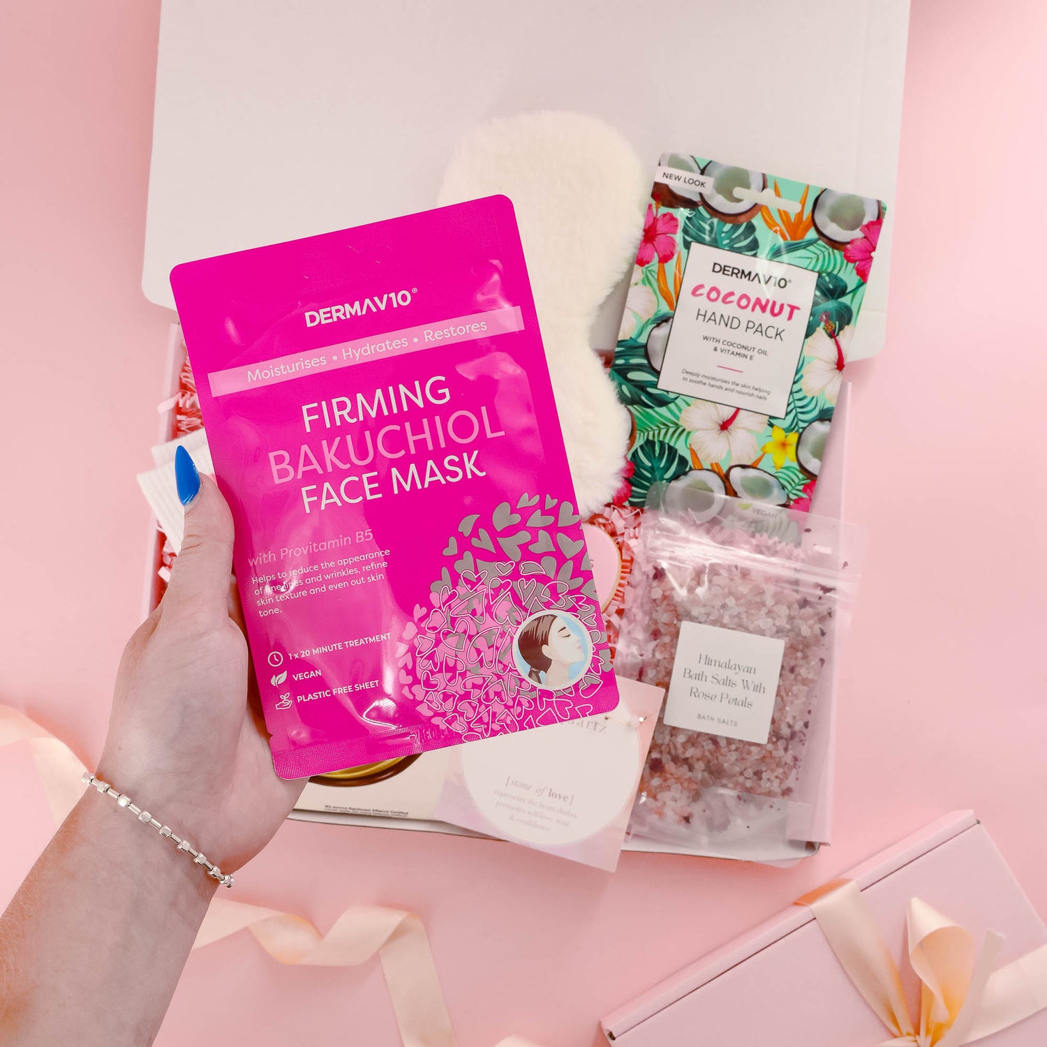 Self care gift for her with pink Bakuchiol face mask, hand treatment, bath salts, and fluffy eye mask – relaxing pamper box for women.