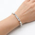 Mama Bracelet with white marbled beads and black letter charms, designed as a stretch-fit fashion accessory celebrating motherhood. Ideal gift for moms and mothers-to-be.