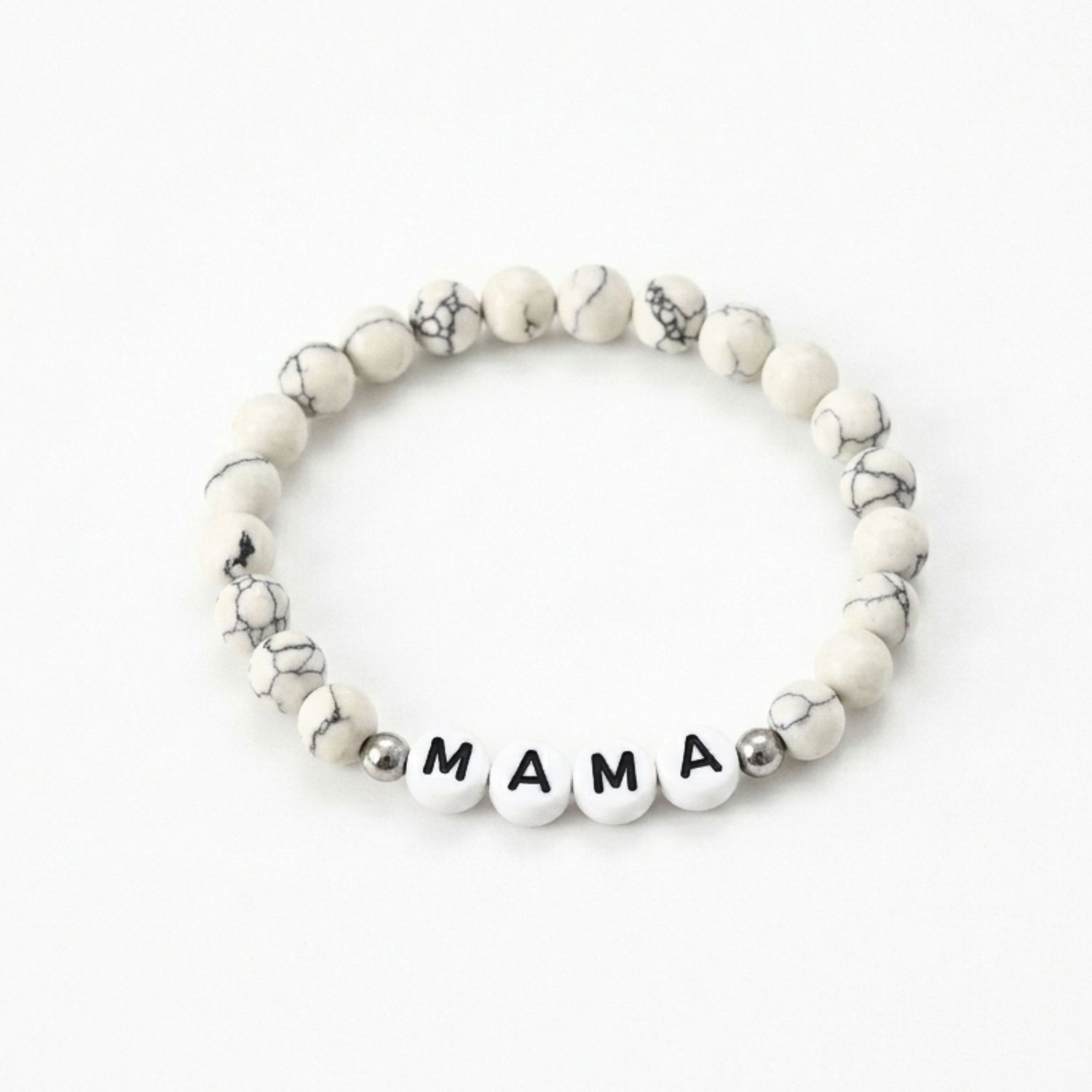 Mama Bracelet with elegant marbled beads and letter charms, designed for comfort and style, perfect for celebrating motherhood or gifting to new moms.