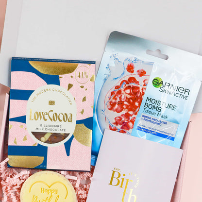 Petite birthday gift box with chocolate, beauty treats, birthday biscuit and card – mini pamper hamper for women