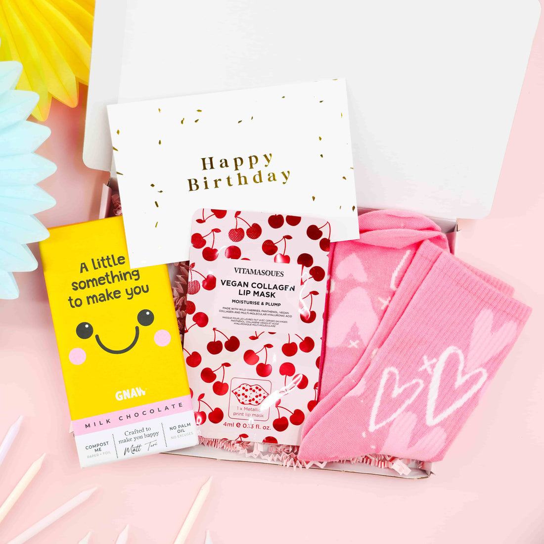Mini Birthday Pamper &amp; Treats Gift Box with pink heart socks, lip mask, and chocolate – perfect birthday gift for her.
