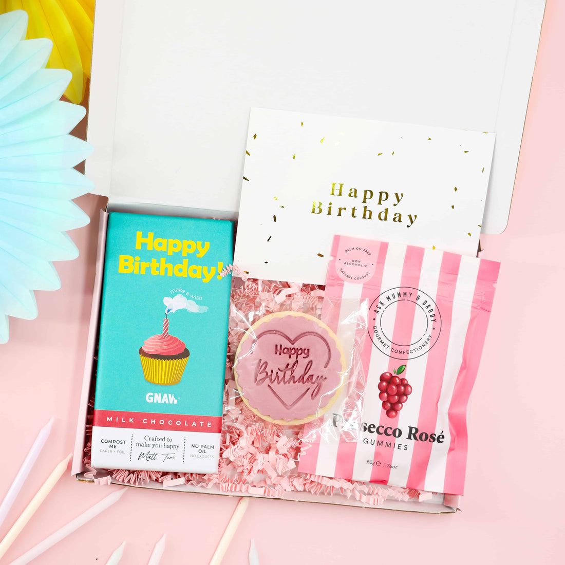 Mini Birthday Indulgence Gift Box with Happy Birthday chocolate, prosecco rosé gummies, iced birthday biscuit and greeting card – perfect birthday gift for her.