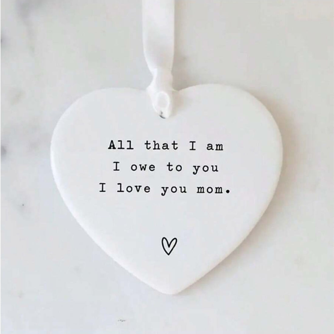 Mum Heart Keepsake, a heart-shaped plastic ornament with black text, perfect as a Mother&