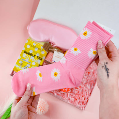 Pink daisy print socks from Pina Colada Birthday Vibes gift box – fun birthday present for women