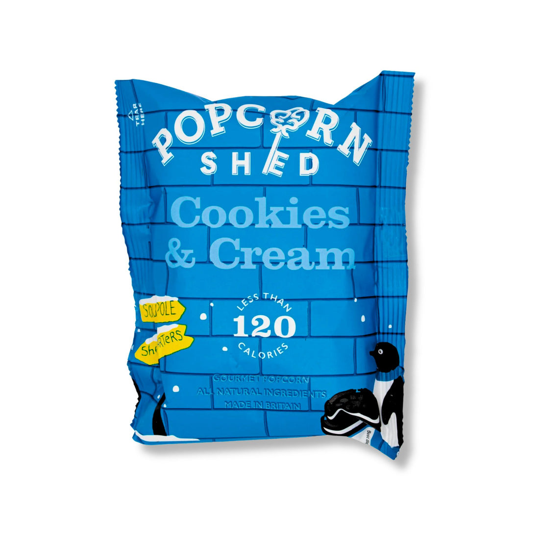 Cookies &amp; Cream Popcorn in a blue bag, showcasing white chocolate caramel popcorn with cookie crumb pieces, highlighting its vegan and all-natural attributes.