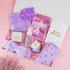 Purple Pamper Birthday Box – luxury birthday gift for her with face mask, socks, soap, candle and skincare in a purple theme