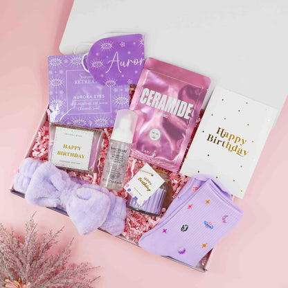 Purple Pamper Birthday Box – luxury birthday gift for her with face mask, socks, soap, candle and skincare in a purple theme