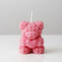 Decorative pink teddy bear candle handcrafted with miniature rose patterns holding a heart, a unique floral-scented gift for birthdays or anniversaries or Mothers day.