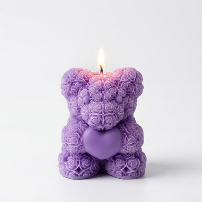 Decorative purple teddy bear candle handcrafted with miniature rose patterns holding a heart, a unique floral-scented gift for birthdays or anniversaries or Mothers day.