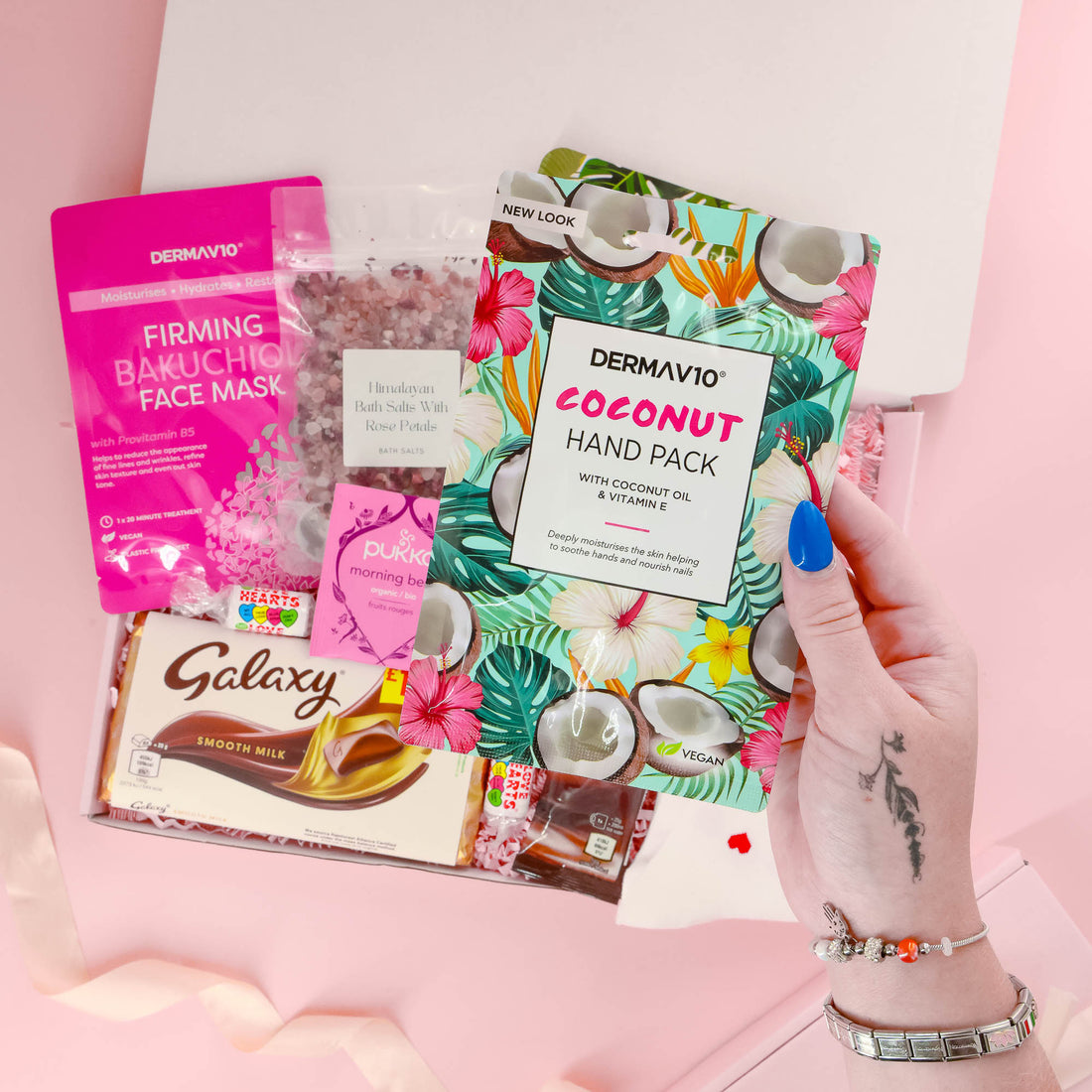Self care gift for her with coconut hand mask, Galaxy chocolate, bath salts, and pamper products – perfect pick-me-up gift box for women.