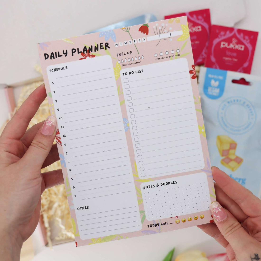 Self care gifts – Relax &amp; Refocus box combining stationery, herbal tea, and relaxing skincare treats
