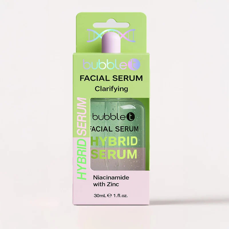 Bubble T Clarifying Facial Serum with niacinamide and zinc, in a box and dropper-top bottle, styled with a tulip and ribbon.