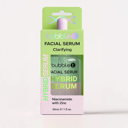 Bubble T Clarifying Facial Serum with niacinamide and zinc, in a box and dropper-top bottle, styled with a tulip and ribbon.