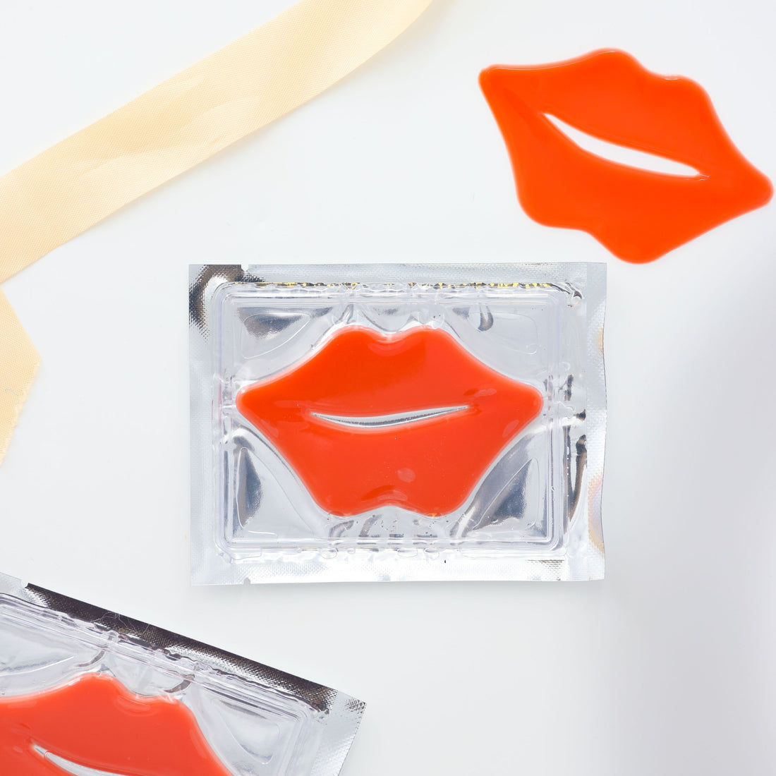 Self care gifts for her – red-orange lip mask to smooth and nourish