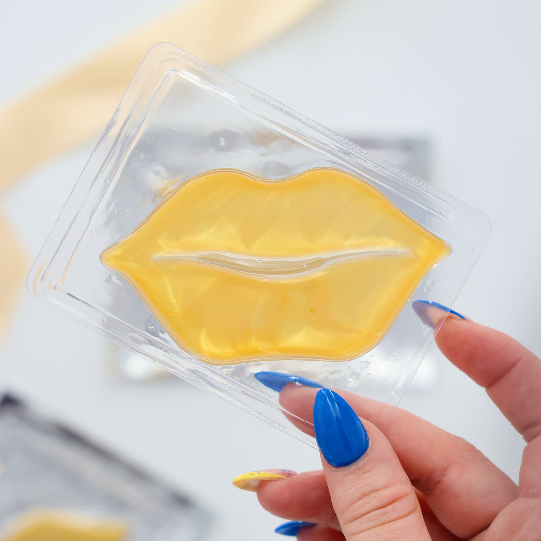 Self care gifts for her – luxe gold lip mask to hydrate and nourish
