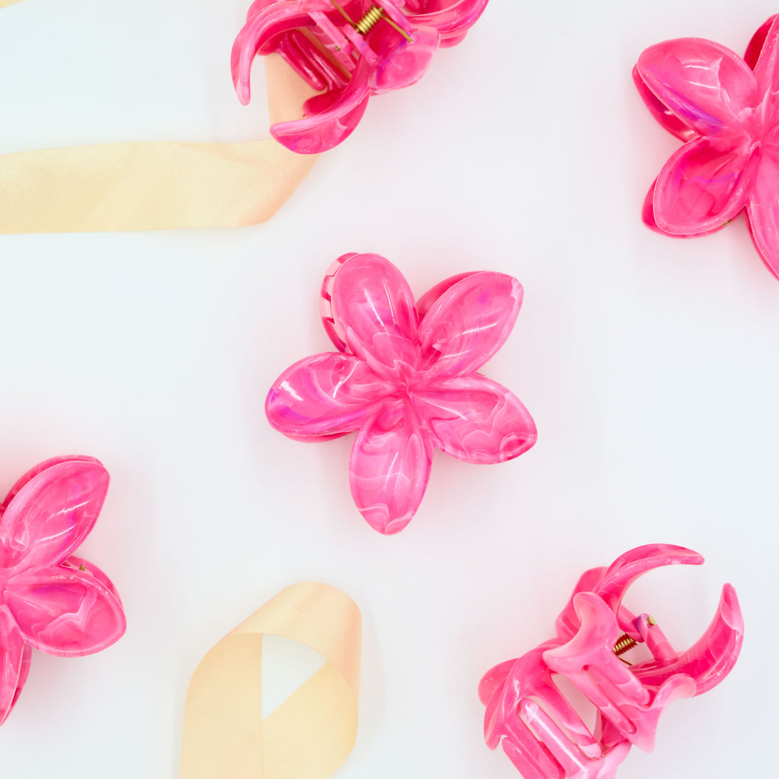 Self care gifts for her – add charm with a pink blossom hair clip
