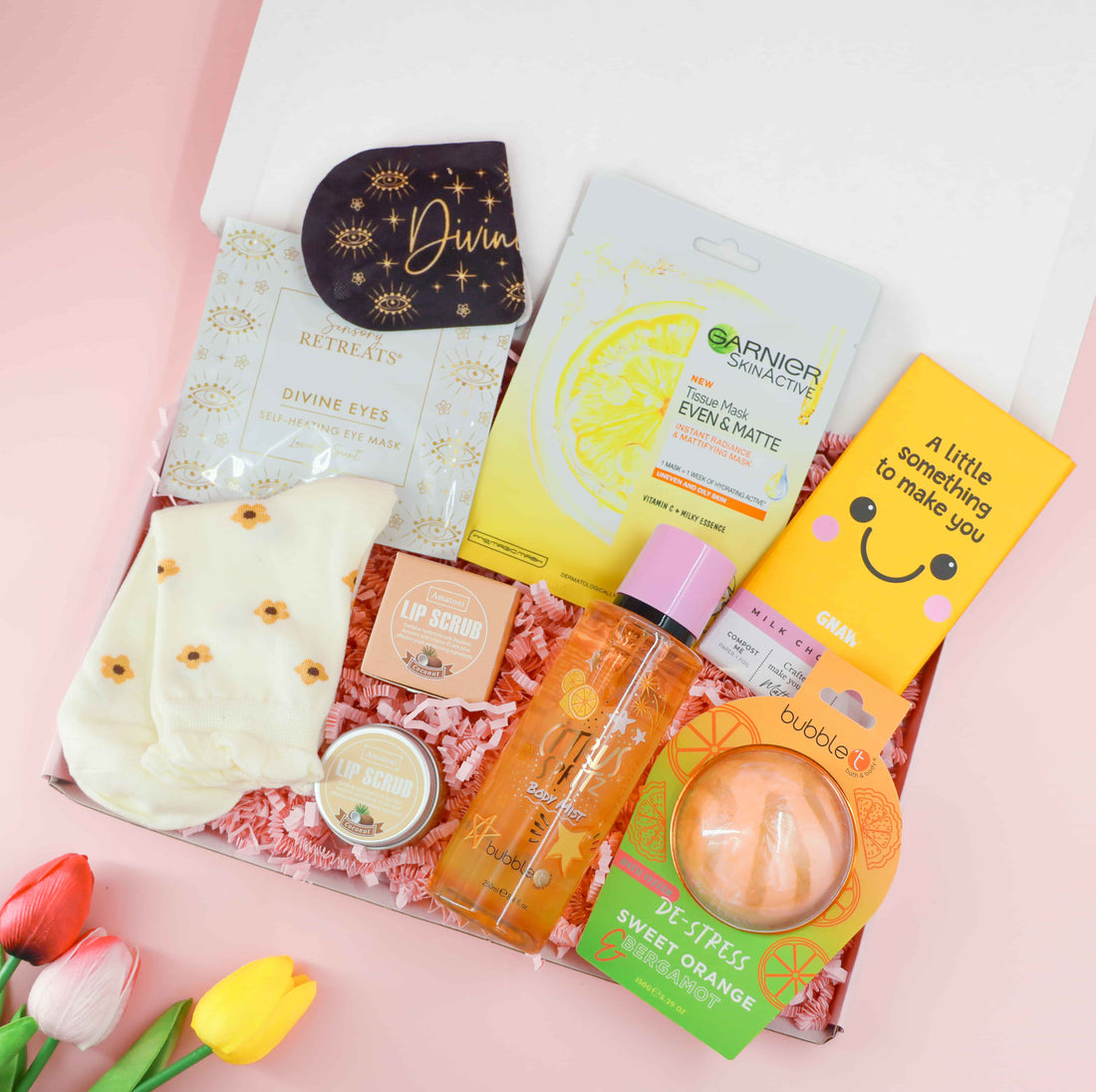 Sending Smiles Birthday Gift Box with daisy socks, vitamin C face mask, citrus body mist, bath fizzer, and chocolate – perfect birthday gift for her