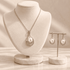 Silver & Pearl Jewelry Set - Timeless Elegance: A close-up of a lustrous pearl in an exquisite silver setting, showcasing sophistication for formal events or everyday elegance.