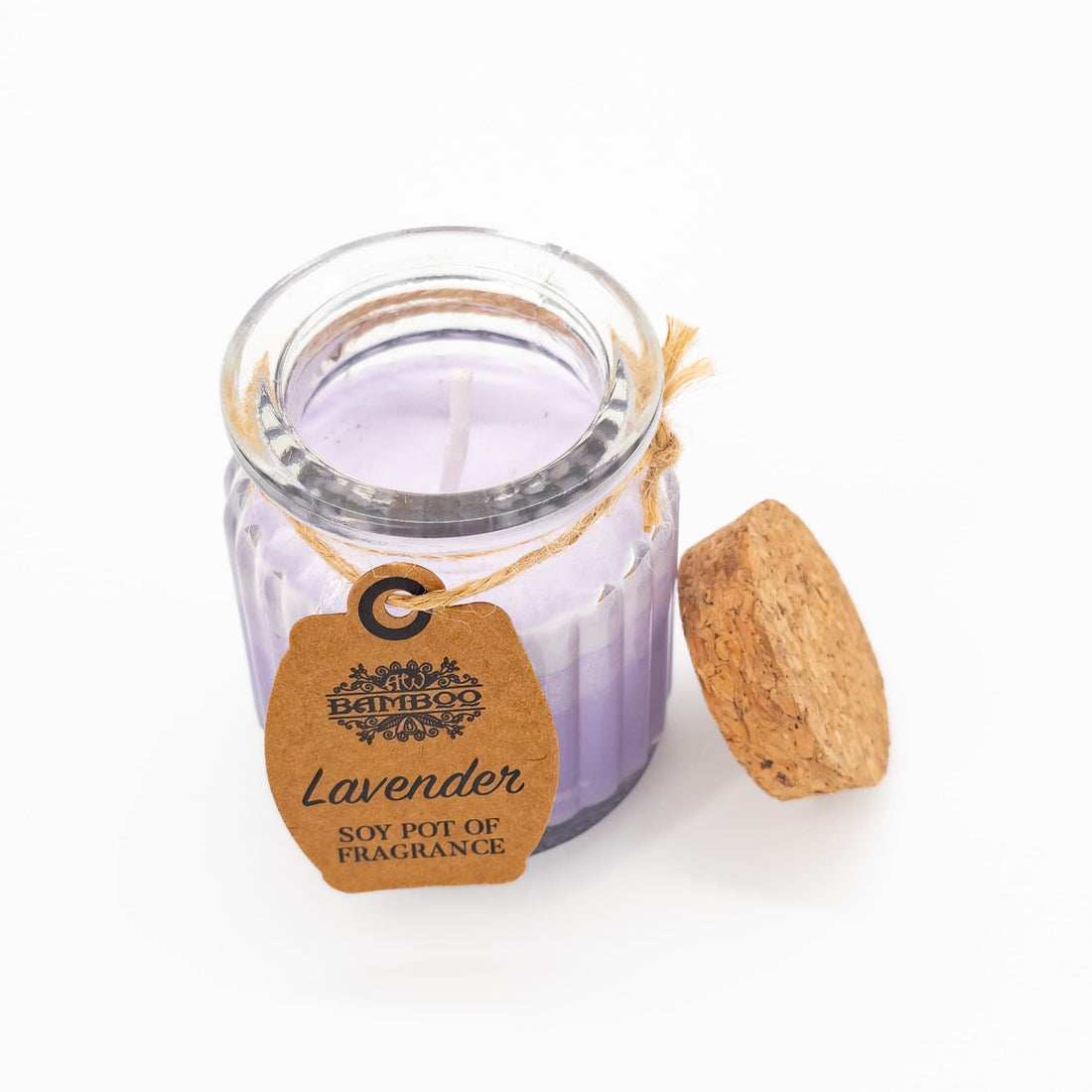 Lavender Candle with cork lid, featuring a soothing lavender scent for relaxation. Burn time: approx 20 hours. Size: 7 x 5.5cm.