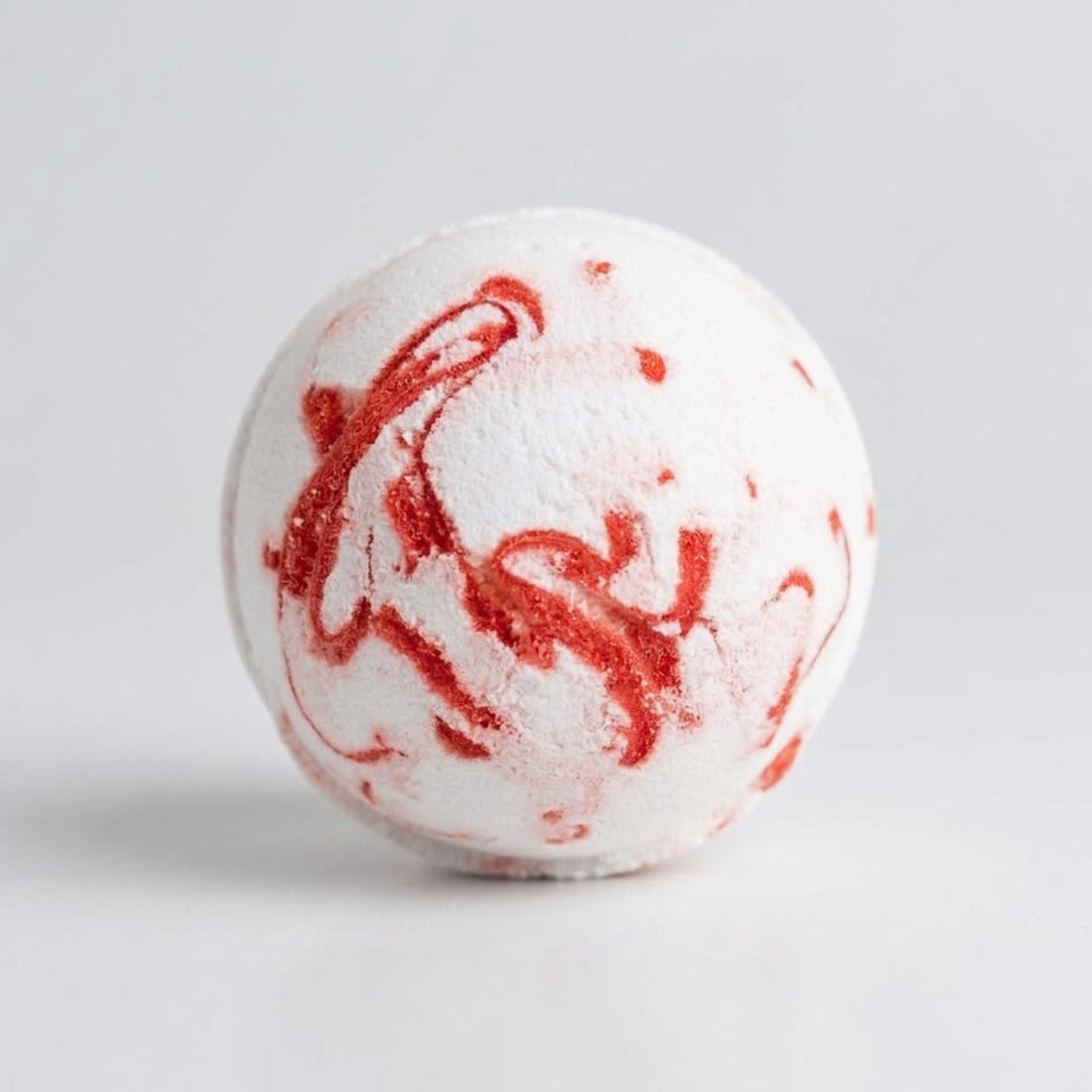 Close-up of the Tropical Paradise Bath Bomb, showcasing its textured surface, hinting at its aromatic dragon fruit, papaya, and mangosteen infusion for a luxurious bath experience. Ideal selfcare gift for her.