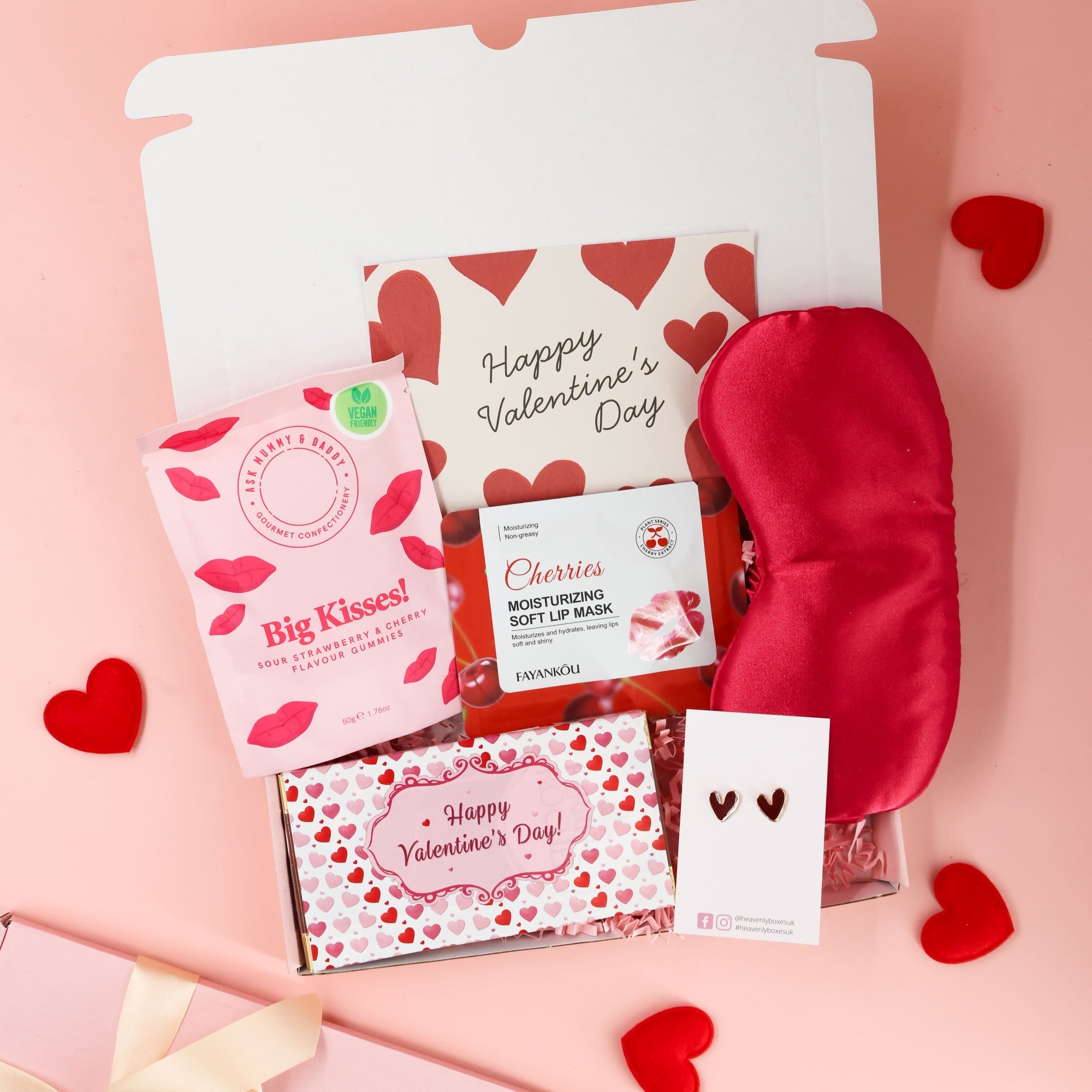 Valentines gift for her featuring pink themed treats, cosy accessories and Valentine’s card
