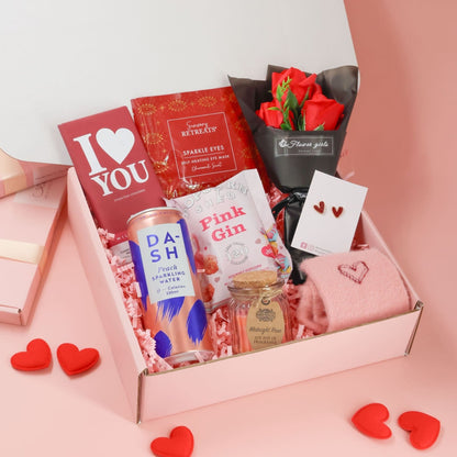 Valentines gift for her featuring chocolate, popcorn, candle and romantic Valentine keepsakes
