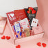 Valentines gift for her featuring chocolate, popcorn, candle and romantic Valentine keepsakes