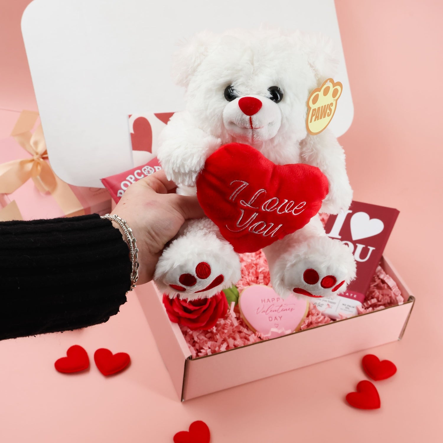 Valentines gift for her featuring cuddly teddy, sweet chocolates and Valentine themed treats