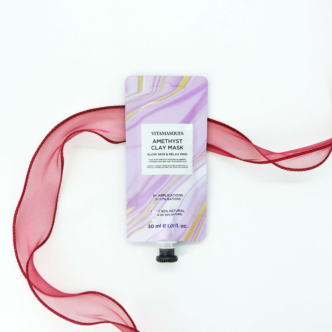 Vitamasques Amethyst Clay Mask with a white label, offering a soothing, detoxifying experience for radiant skin and a spa-like self-care routine.