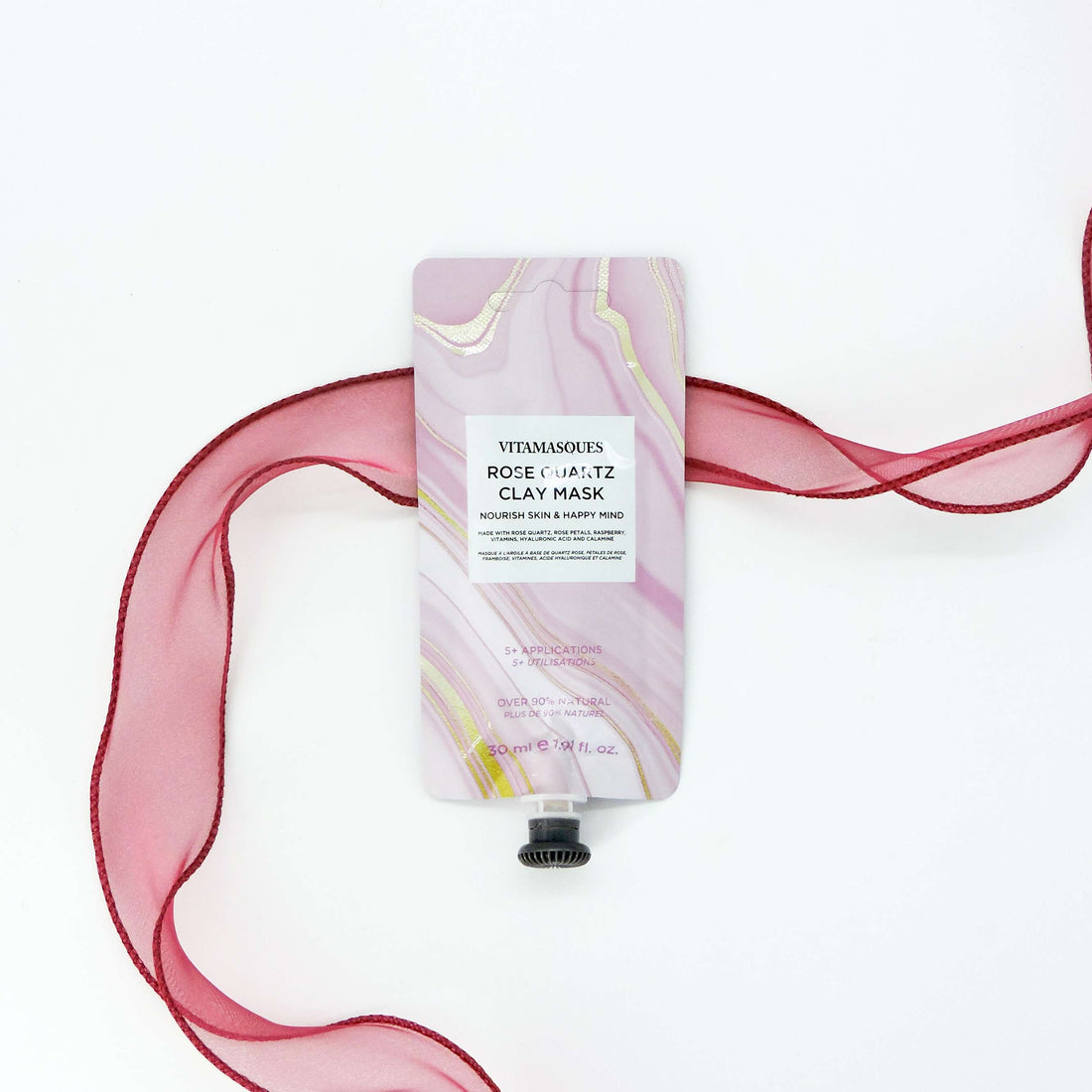 Vitamasques Rose Quartz Clay Mask close-up, showcasing its creamy texture, ideal for hydrating and revitalizing skin, enhancing self-care and relaxation routines.